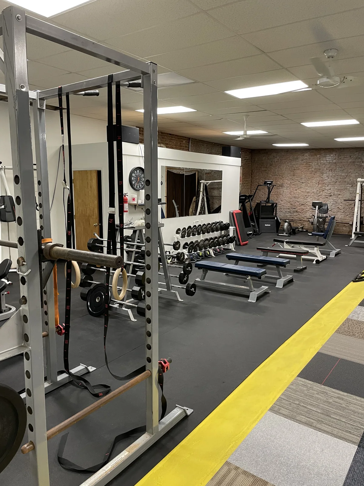 Strength training equipment inside the Get Pumped Up studio